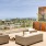 Rooftop lounge with firepit and incredible view